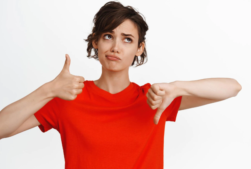 girl showing thumbs up and thumbs down