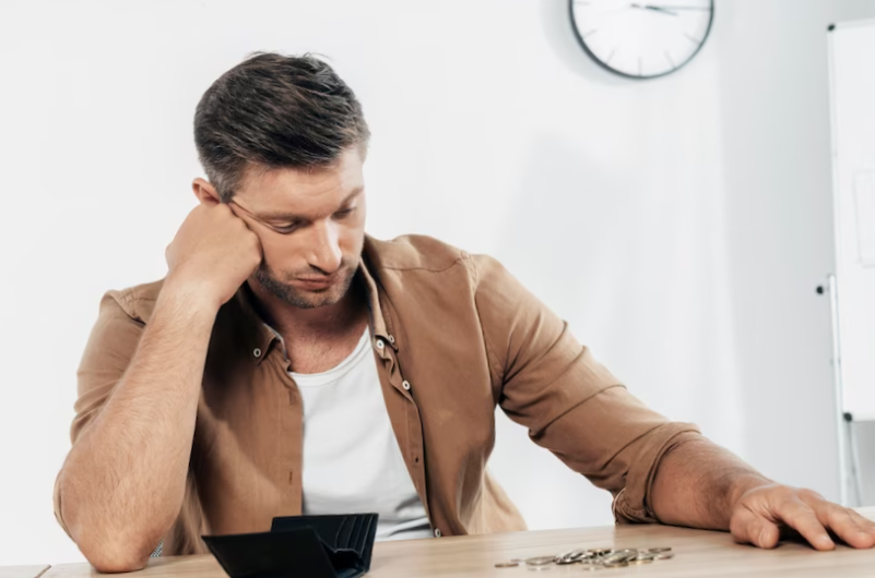 medium shot tired man with coins